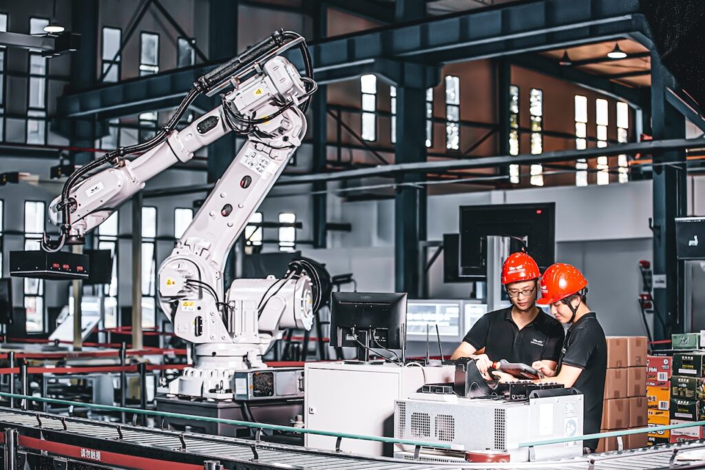 Robots working in smart manufacturing industry